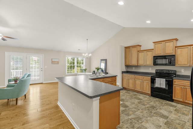 21 Upland Ct, Stuarts Draft, VA 24477 - kitchen with black appliances, dark countertops, ceiling fan, a chandelier, and high vaulted ceiling