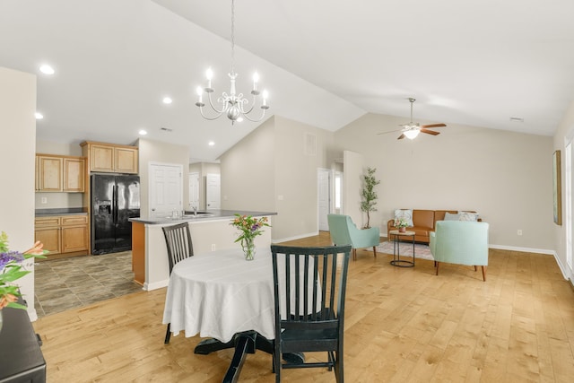 21 Upland Ct, Stuarts Draft, VA 24477 - dining area featuring lofted ceiling, light wood-type flooring, a ceiling fan, a chandelier, and recessed lighting