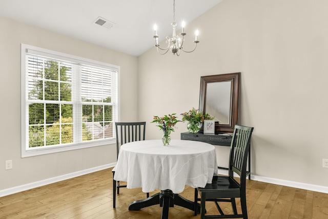 21 Upland Ct, Stuarts Draft, VA 24477 - dining room with a chandelier, light wood finished floors, healthy amount of natural light, and high vaulted ceiling