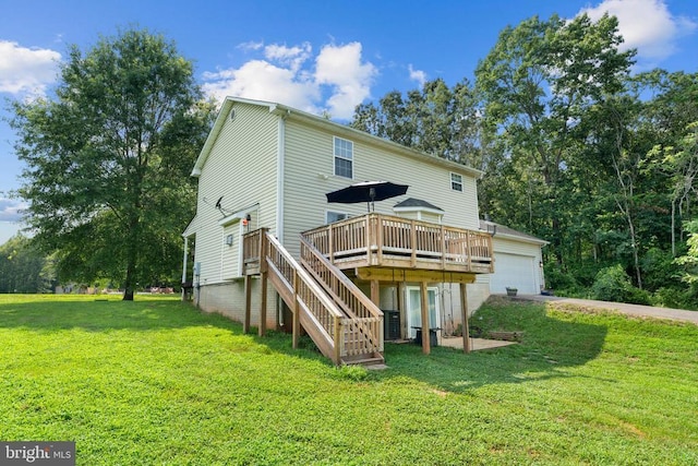  - rear view of property with a yard, a deck, and stairway