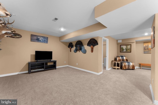  - living area with carpet flooring and baseboards