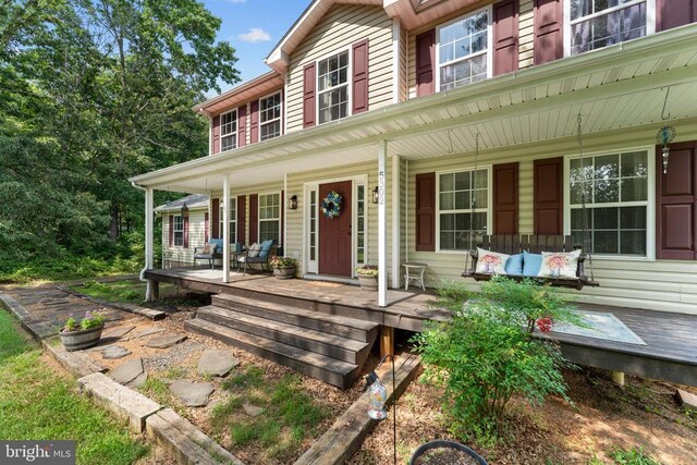  - view of front facade featuring a porch