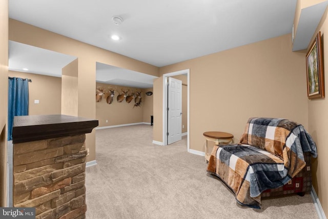  - sitting room with carpet flooring and recessed lighting