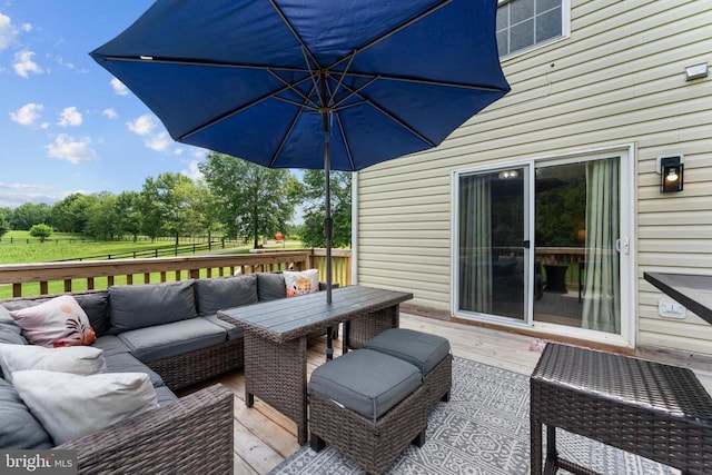  - wooden terrace featuring outdoor lounge area and outdoor dining space