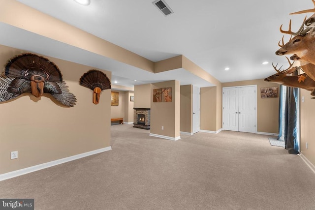  - unfurnished living room featuring light carpet and recessed lighting
