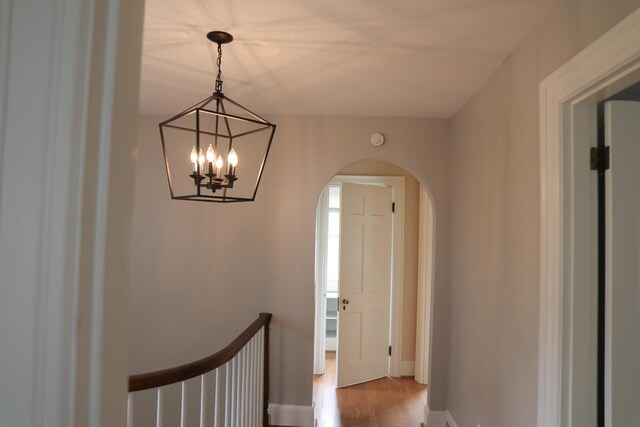 844 Lyndhurst Rd, Waynesboro, VA 22980 - hall featuring a chandelier, arched walkways, and wood finished floors