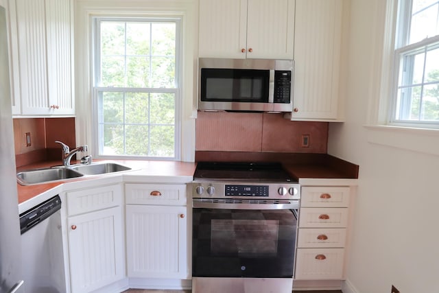 844 Lyndhurst Rd, Waynesboro, VA 22980 - kitchen with stainless steel appliances and white cabinetry