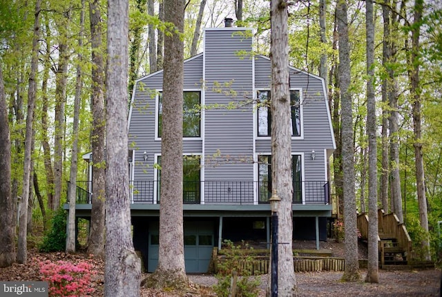 107 Birchside Cir, Locust Grove, VA 22508 - rear view of house featuring a deck and a chimney