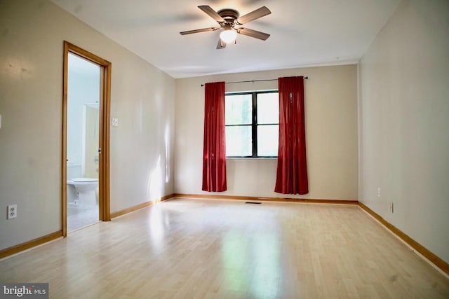 107 Birchside Cir, Locust Grove, VA 22508 - spare room with a ceiling fan, wood finished floors, and baseboards