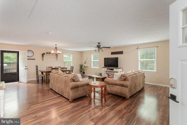 159 Park View Ln, Shenandoah, VA 22849 - living area with dark wood-style flooring, healthy amount of natural light, a ceiling fan, and a textured ceiling