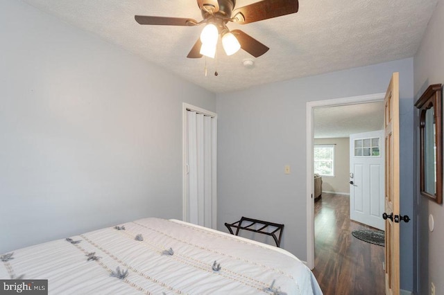 159 Park View Ln, Shenandoah, VA 22849 - bedroom with wood finished floors, a closet, a textured ceiling, and ceiling fan