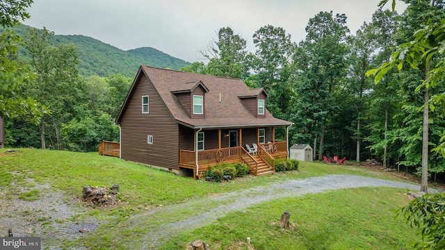 159 Park View Ln, Shenandoah, VA 22849 - chalet / cabin featuring a shed, a porch, a front lawn, a mountain view, and driveway