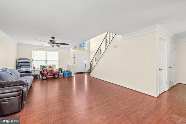 1745 Finley Dr, Culpeper, VA 22701 - living area with wood finished floors, crown molding, a ceiling fan, and stairway