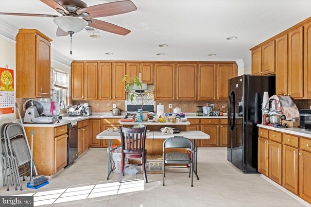 1745 Finley Dr, Culpeper, VA 22701 - kitchen with freestanding refrigerator, light countertops, ceiling fan, backsplash, and ornamental molding