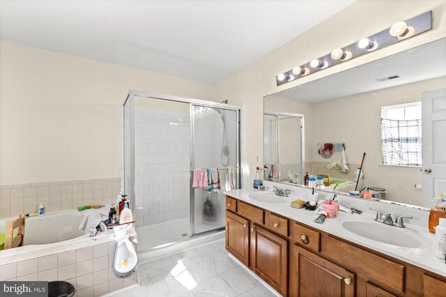 1745 Finley Dr, Culpeper, VA 22701 - bathroom with a garden tub, double vanity, a shower stall, and marble look tile flooring