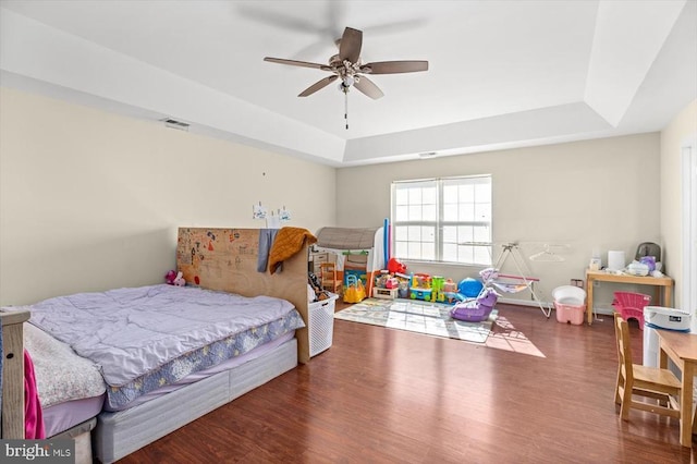 1745 Finley Dr, Culpeper, VA 22701 - bedroom with a tray ceiling, wood finished floors, and a ceiling fan