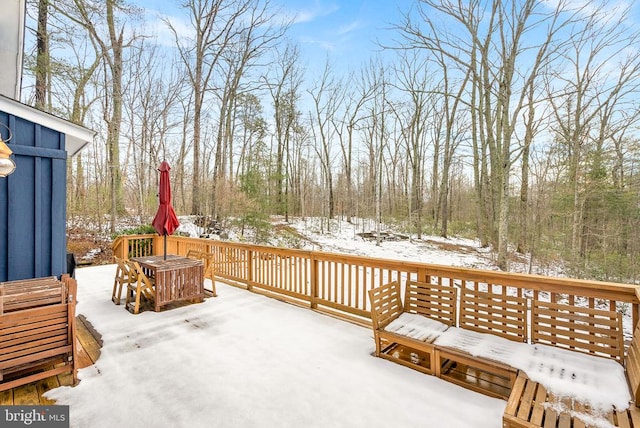 view of snow covered deck