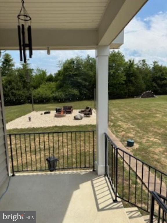 balcony featuring a fire pit