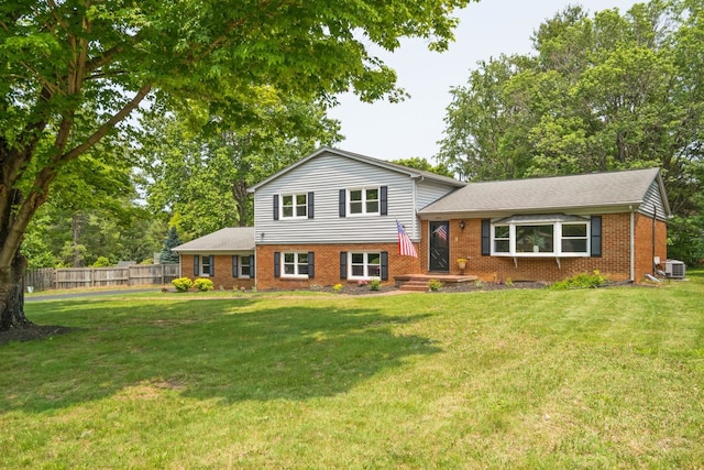 2822 Plantation Ln, Waynesboro, VA 22980 - tri-level home featuring brick siding, cooling unit, and roof with shingles