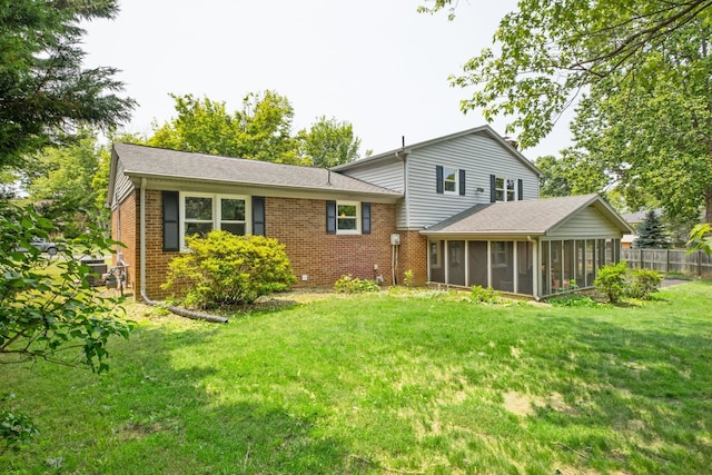 2822 Plantation Ln, Waynesboro, VA 22980 - back of property featuring a sunroom, brick siding, and roof with shingles