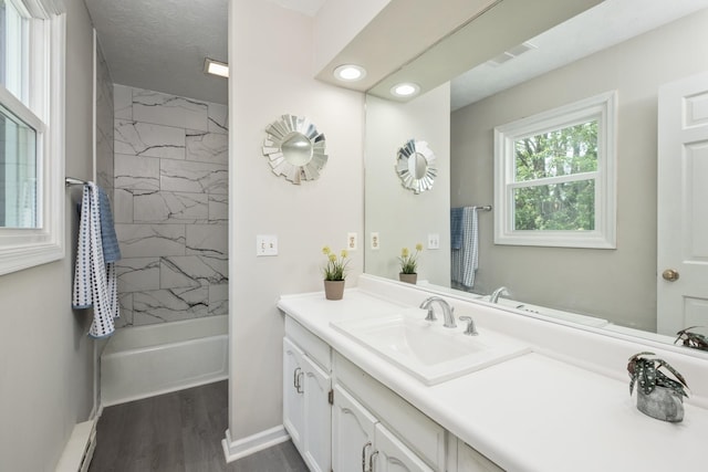2822 Plantation Ln, Waynesboro, VA 22980 - full bath with vanity, wood finished floors, recessed lighting, washtub / shower combination, and baseboards