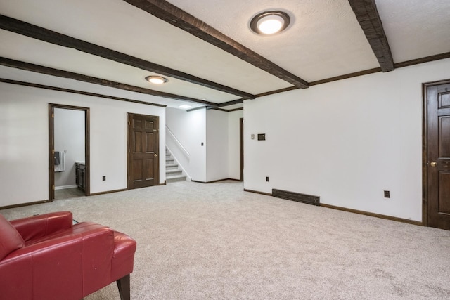 2822 Plantation Ln, Waynesboro, VA 22980 - carpeted living room featuring beam ceiling, baseboards, and stairs