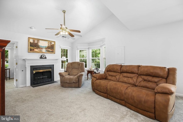 11611 Hampshire Ct, Fredericksburg, VA 22407 - carpeted living area with a ceiling fan, lofted ceiling, a fireplace with flush hearth, and electric panel