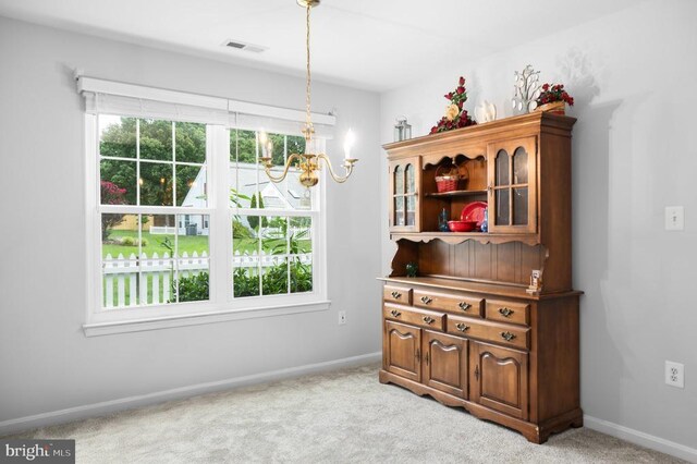 11611 Hampshire Ct, Fredericksburg, VA 22407 - dining space with a chandelier and light carpet