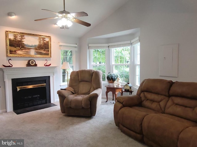 11611 Hampshire Ct, Fredericksburg, VA 22407 - living room with a ceiling fan, vaulted ceiling, carpet flooring, and a fireplace with flush hearth