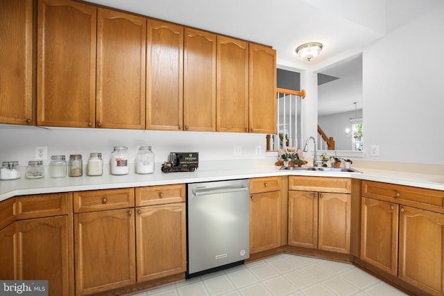11611 Hampshire Ct, Fredericksburg, VA 22407 - kitchen with dishwasher, brown cabinets, and light countertops