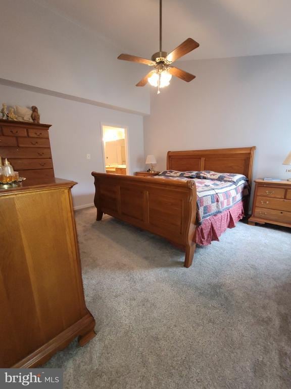 11611 Hampshire Ct, Fredericksburg, VA 22407 - bedroom with carpet, a ceiling fan, vaulted ceiling, and ensuite bath