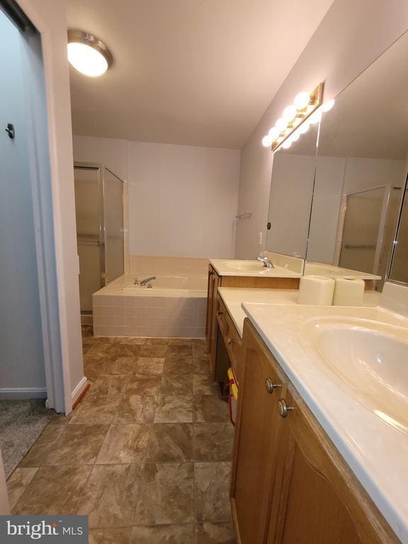11611 Hampshire Ct, Fredericksburg, VA 22407 - full bath with double vanity, a garden tub, and a shower with door