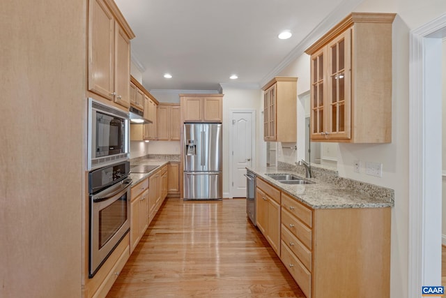 75 Cottage Ct, Zion Crossroads, VA 22942 - kitchen with stainless steel appliances, light brown cabinets, a sink, ornamental molding, and light stone counters