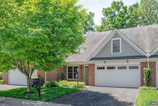 75 Cottage Ct, Zion Crossroads, VA 22942 - view of front facade featuring brick siding, driveway, and roof with shingles