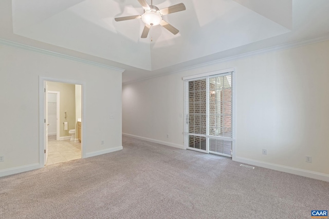 75 Cottage Ct, Zion Crossroads, VA 22942 - spare room with light colored carpet, a tray ceiling, a ceiling fan, ornamental molding, and baseboards