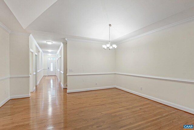 75 Cottage Ct, Zion Crossroads, VA 22942 - empty room featuring a chandelier, light wood finished floors, crown molding, and baseboards