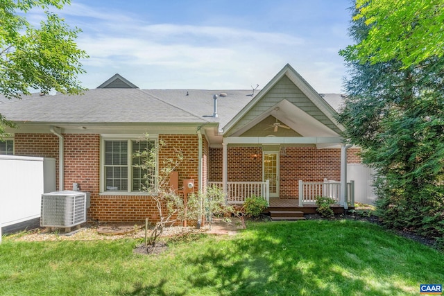 75 Cottage Ct, Zion Crossroads, VA 22942 - view of front facade featuring cooling unit, a wooden deck, brick siding, roof with shingles, and a ceiling fan