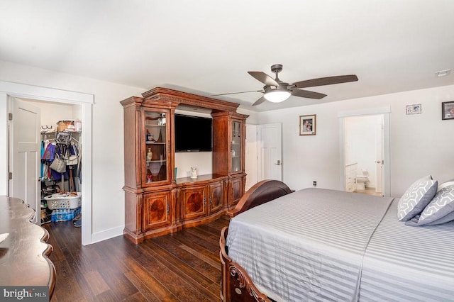 8806 Commons Cir, Spotsylvania, VA 22553 - bedroom with a walk in closet, dark wood-style floors, a closet, ceiling fan, and ensuite bath