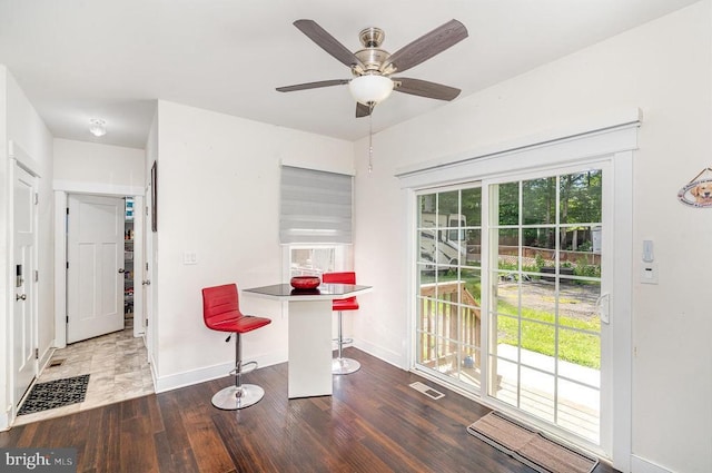 8806 Commons Cir, Spotsylvania, VA 22553 - unfurnished dining area featuring wood finished floors and ceiling fan