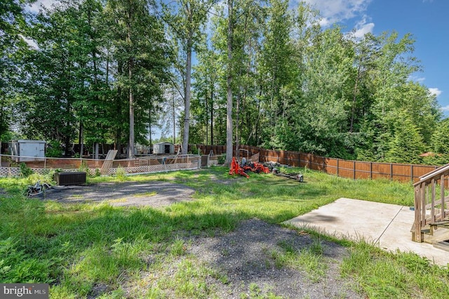 8806 Commons Cir, Spotsylvania, VA 22553 - fenced backyard featuring a patio area and a shed