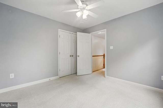 538 Colony Ct, Warrenton, VA 20186 - unfurnished bedroom featuring carpet flooring, baseboards, a closet, and ceiling fan