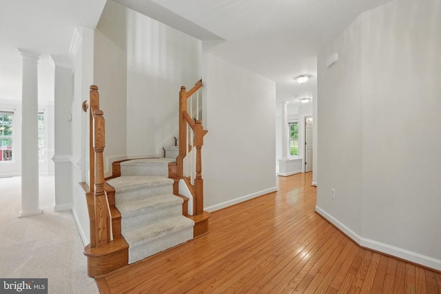 538 Colony Ct, Warrenton, VA 20186 - stairway featuring wood-type flooring and ornate columns