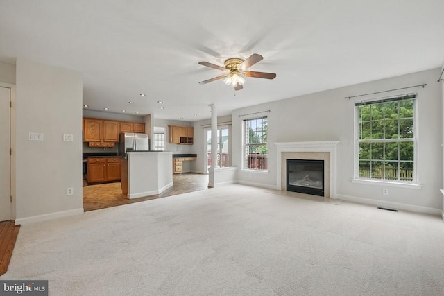 538 Colony Ct, Warrenton, VA 20186 - unfurnished living room featuring a ceiling fan, baseboards, a premium fireplace, light colored carpet, and recessed lighting