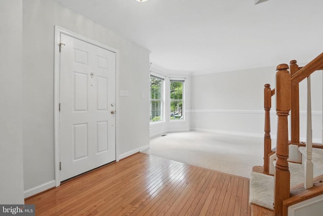 538 Colony Ct, Warrenton, VA 20186 - entrance foyer with stairway, baseboards, and hardwood / wood-style floors