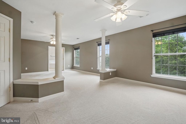 538 Colony Ct, Warrenton, VA 20186 - spare room with decorative columns, a ceiling fan, light colored carpet, and baseboards