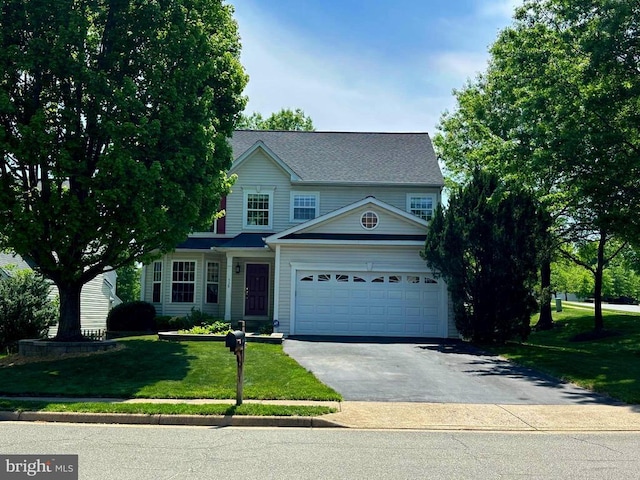 538 Colony Ct, Warrenton, VA 20186 - view of front facade featuring driveway, a garage, and a front lawn