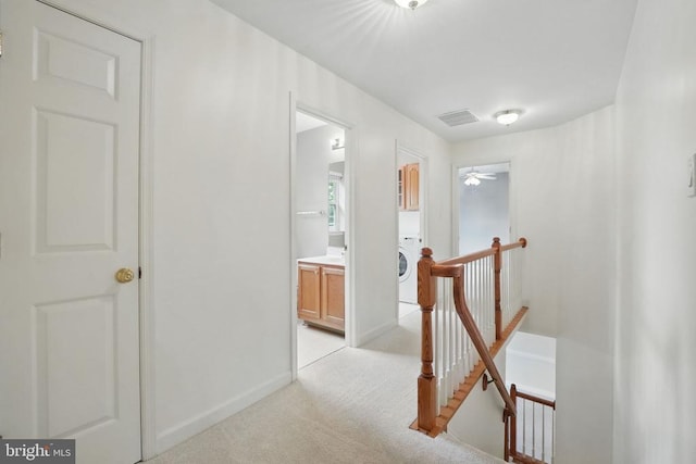 538 Colony Ct, Warrenton, VA 20186 - hallway with an upstairs landing, light carpet, and baseboards