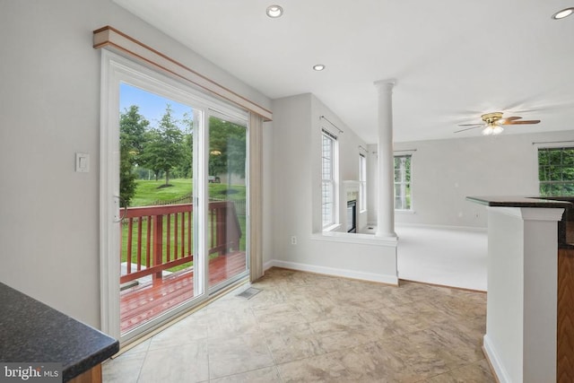 538 Colony Ct, Warrenton, VA 20186 - unfurnished dining area with healthy amount of natural light, a ceiling fan, decorative columns, and recessed lighting