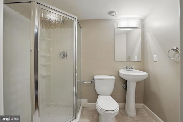 538 Colony Ct, Warrenton, VA 20186 - bathroom with toilet, a stall shower, baseboards, and tile patterned flooring