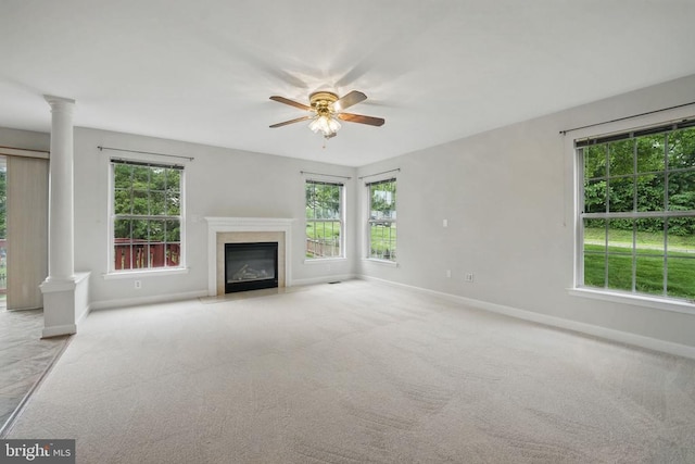 538 Colony Ct, Warrenton, VA 20186 - unfurnished living room with ornate columns, a ceiling fan, baseboards, and carpet